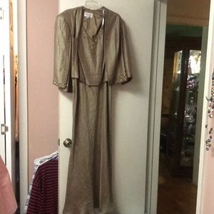 Mother of the bride or groom dress size 18 it’s gorgeous! Worn 1 time!